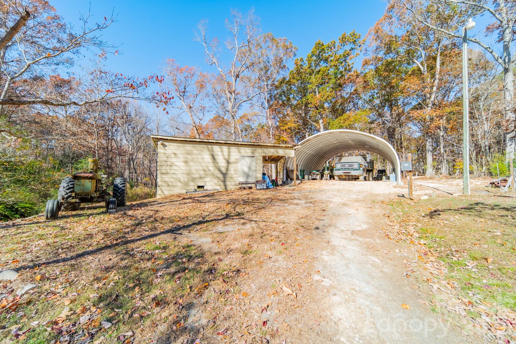 6524 The Little Road Waxhaw, NC 28173 - Photo 10 of 25 a view of road with large trees
