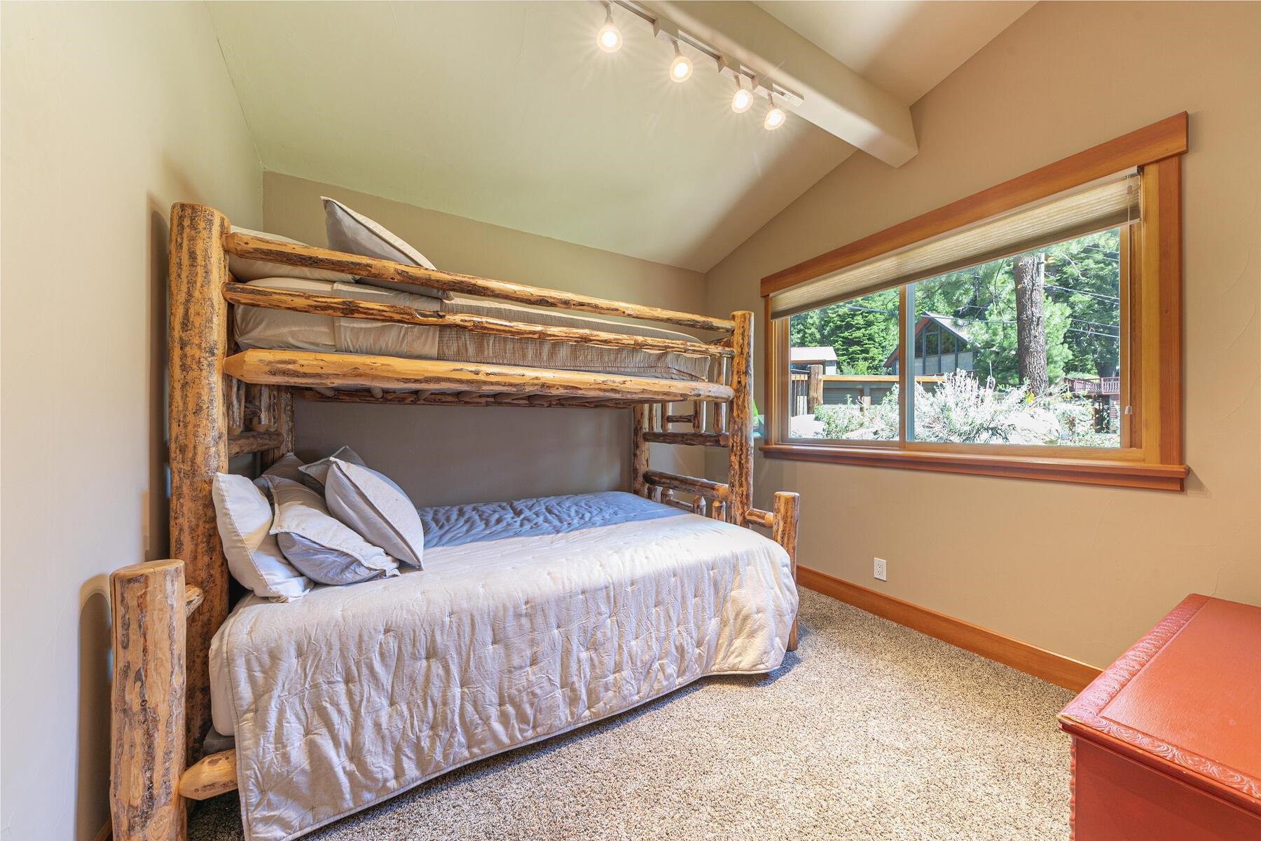 1221 Sandy Way Olympic Valley, CA 96146 - Photo 13 of 28 a bedroom with a bed and window