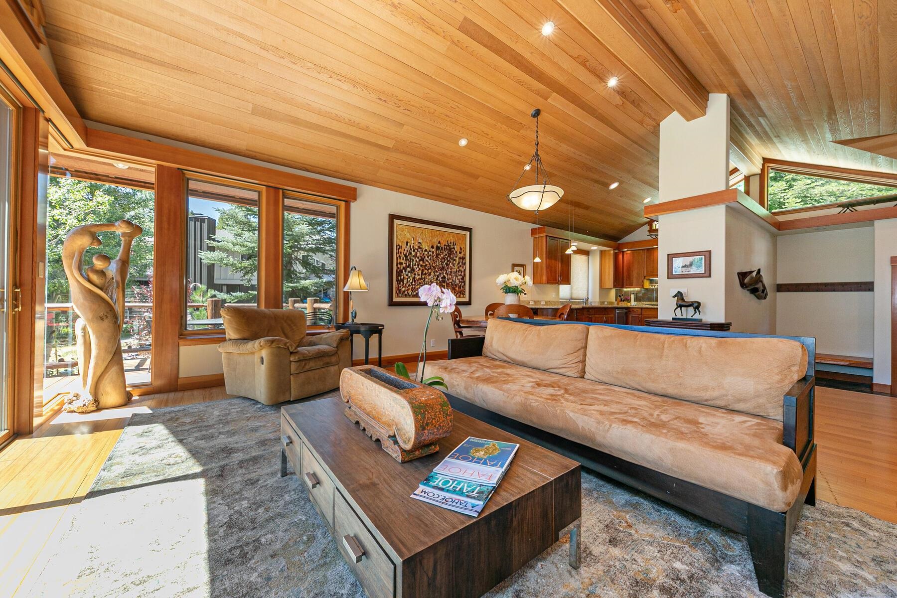 1221 Sandy Way Olympic Valley, CA 96146 - Photo 3 of 28 a living room with fireplace furniture and a large window