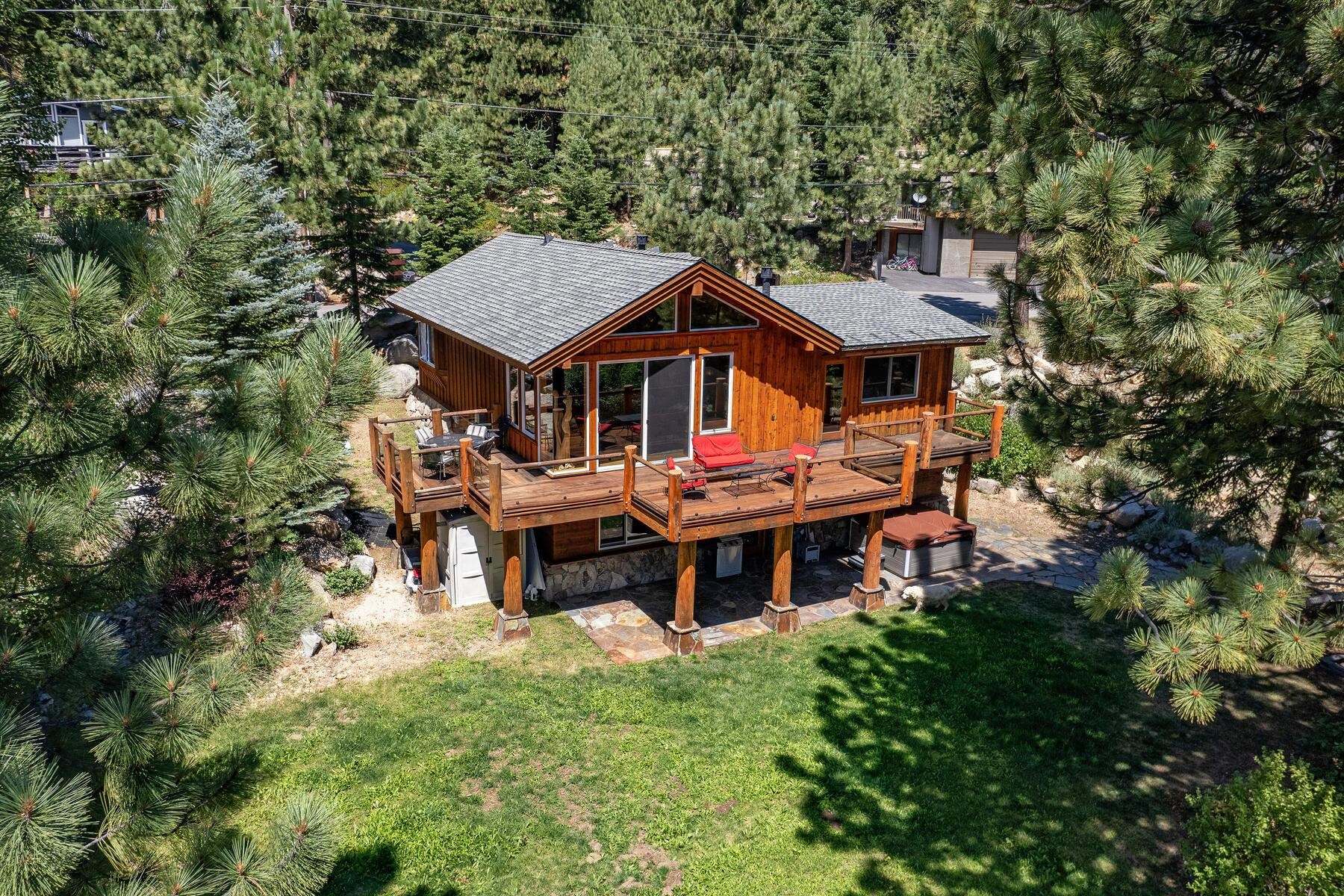 1221 Sandy Way Olympic Valley, CA 96146 - Photo 9 of 28 an aerial view of a house with garden space and a patio