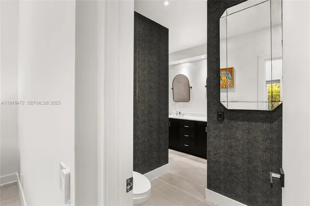 a view of swimming pool with a garden and plants