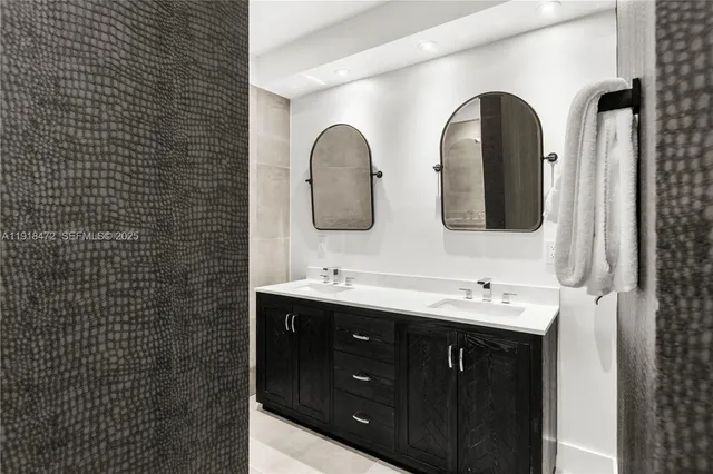 a front view of a house with plants and garden