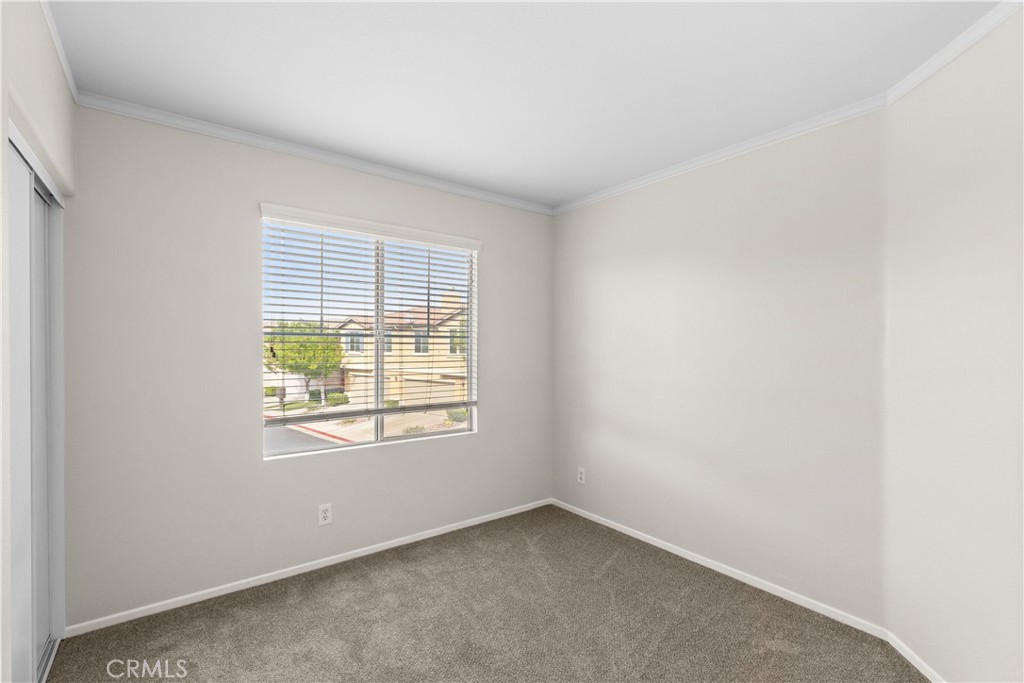 33657 Emerson Way, Unit C Temecula, CA 92592 - Photo 16 of 32 an empty room with a window