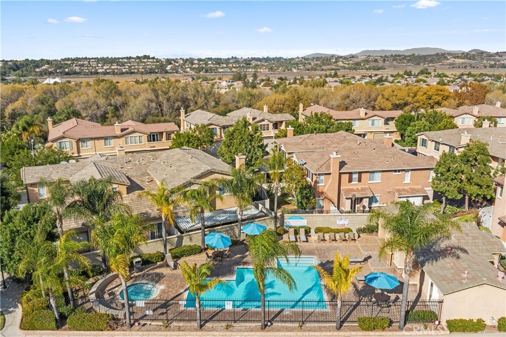 33657 Emerson Way, Unit C Temecula, CA 92592 - Photo 28 of 32 an aerial view of residential building and lake