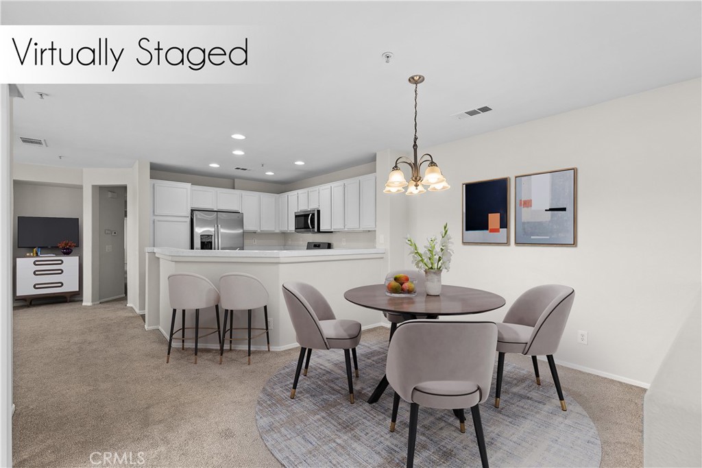 33657 Emerson Way, Unit C Temecula, CA 92592 - Photo 3 of 32 a dining room with furniture and window