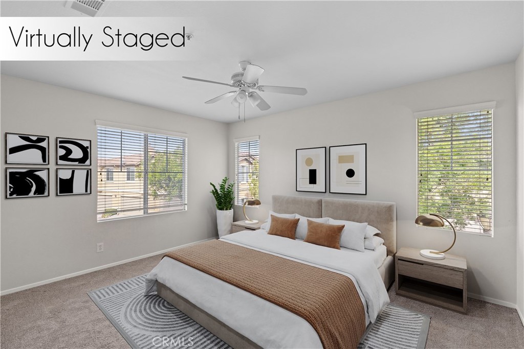 33657 Emerson Way, Unit C Temecula, CA 92592 - Photo 9 of 32 a spacious bedroom with a bed and a window