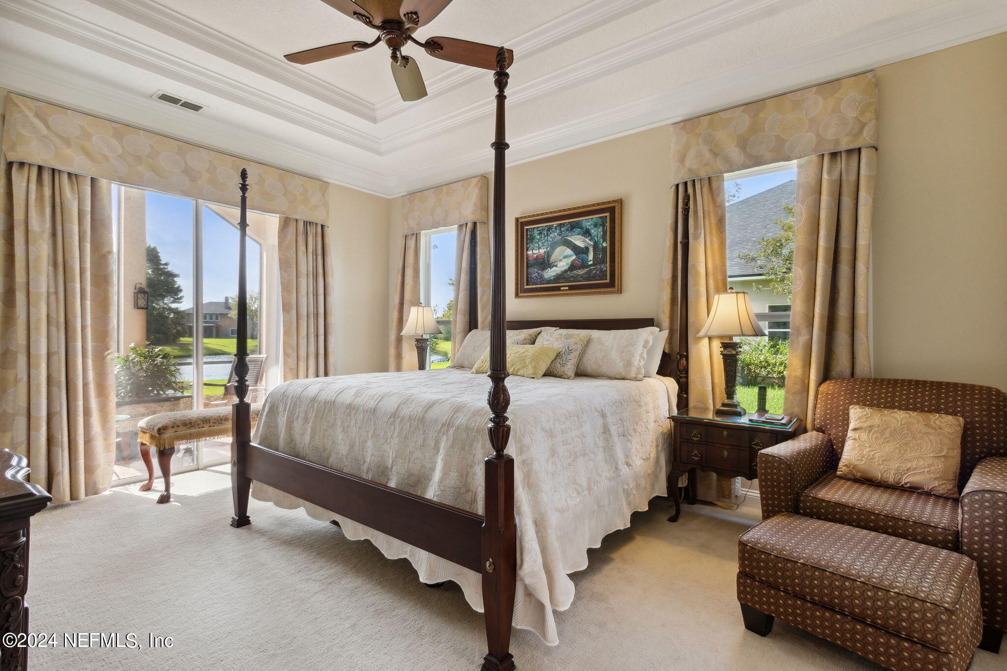 270 Holland Drive St. Augustine, FL 32095 - Photo 18 of 60 a bedroom with a bed couch and window