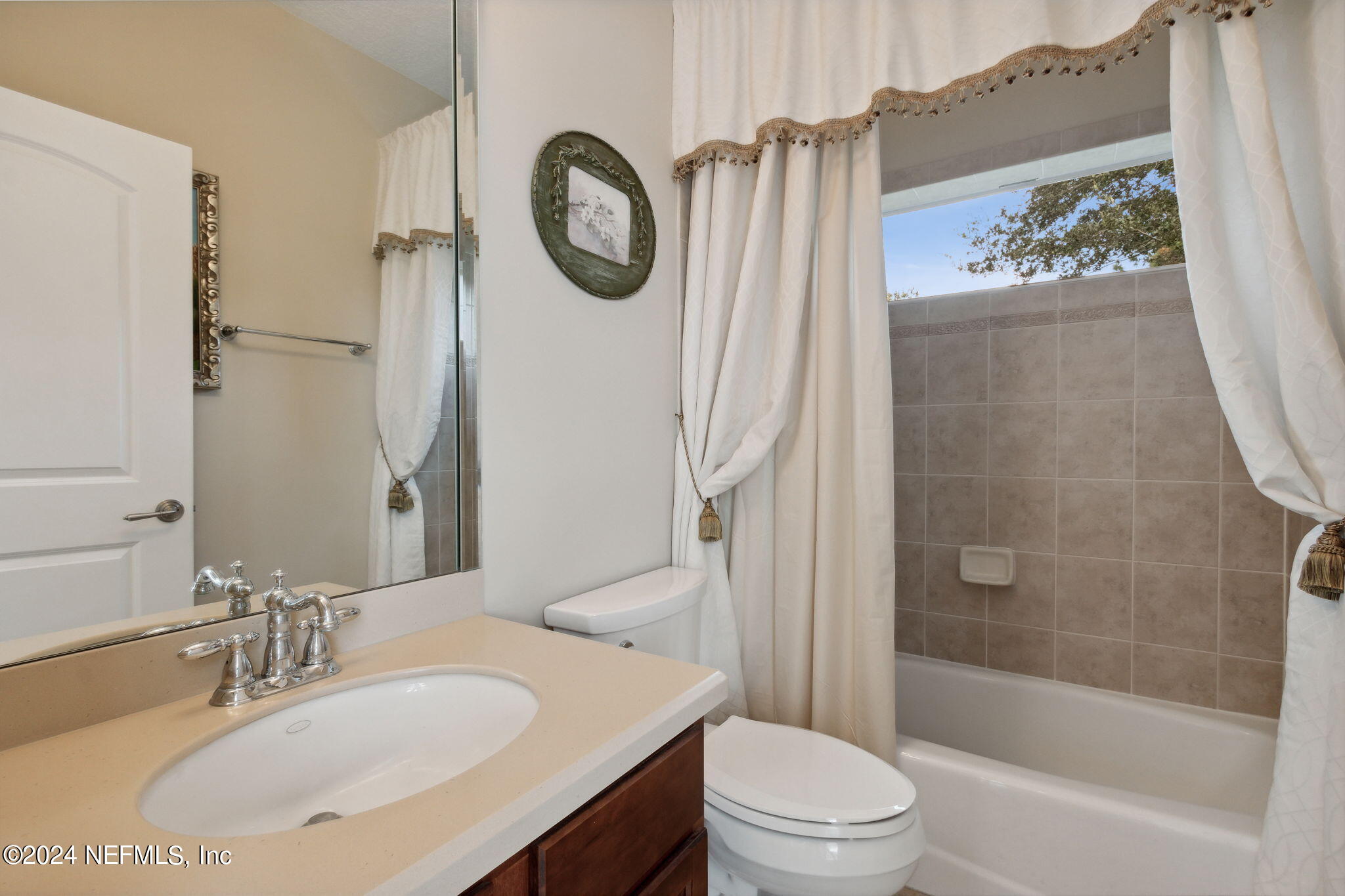 270 Holland Drive St. Augustine, FL 32095 - Photo 29 of 60 a bathroom with a sink toilet and shower