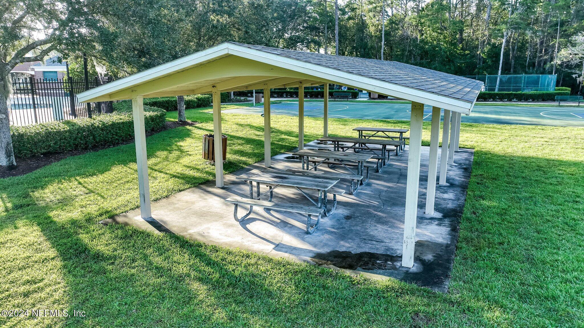 270 Holland Drive St. Augustine, FL 32095 - Photo 52 of 60 a front view of a house with garden