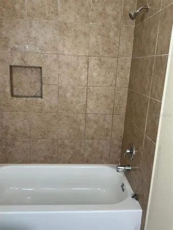 a bathroom with a bathtub