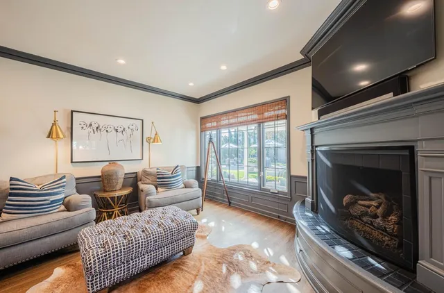 a view of front door and porch with wooden floor