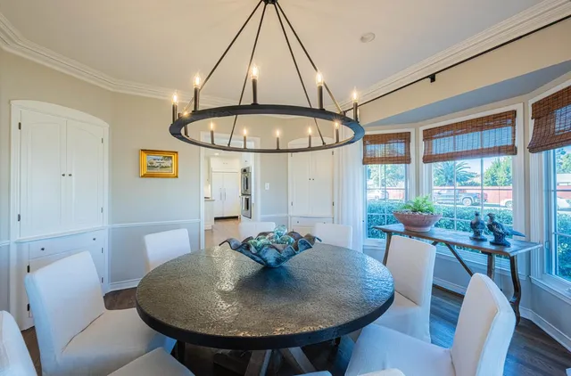 a bathroom with a granite countertop sink mirror toilet and shower