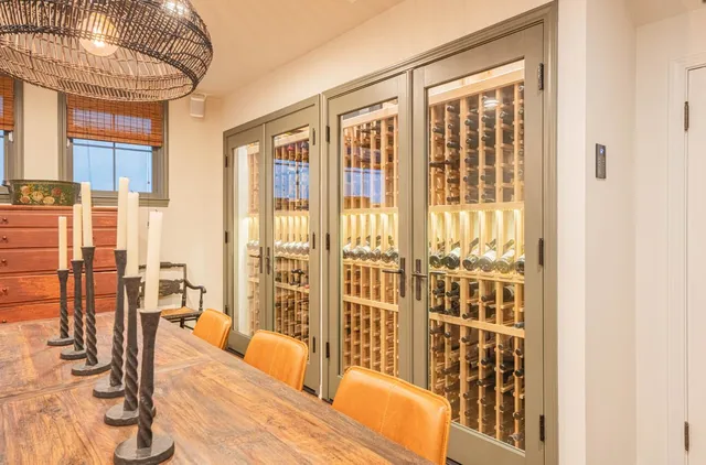 an aerial view of a house with garden space and street view