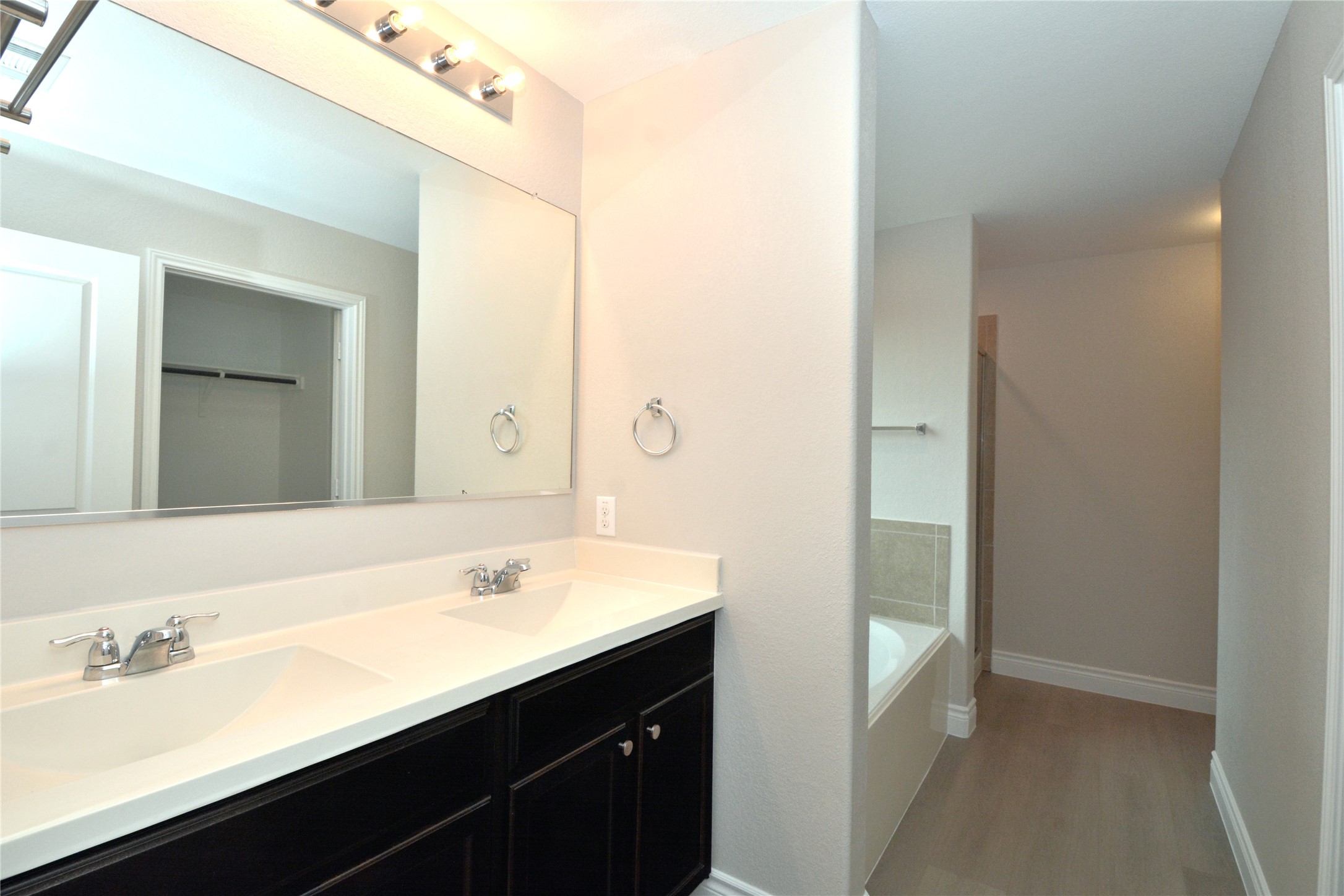 3901 Colorado High Avenue Austin, TX 78744 - Photo 15 of 39 a bathroom with a sink and a mirror