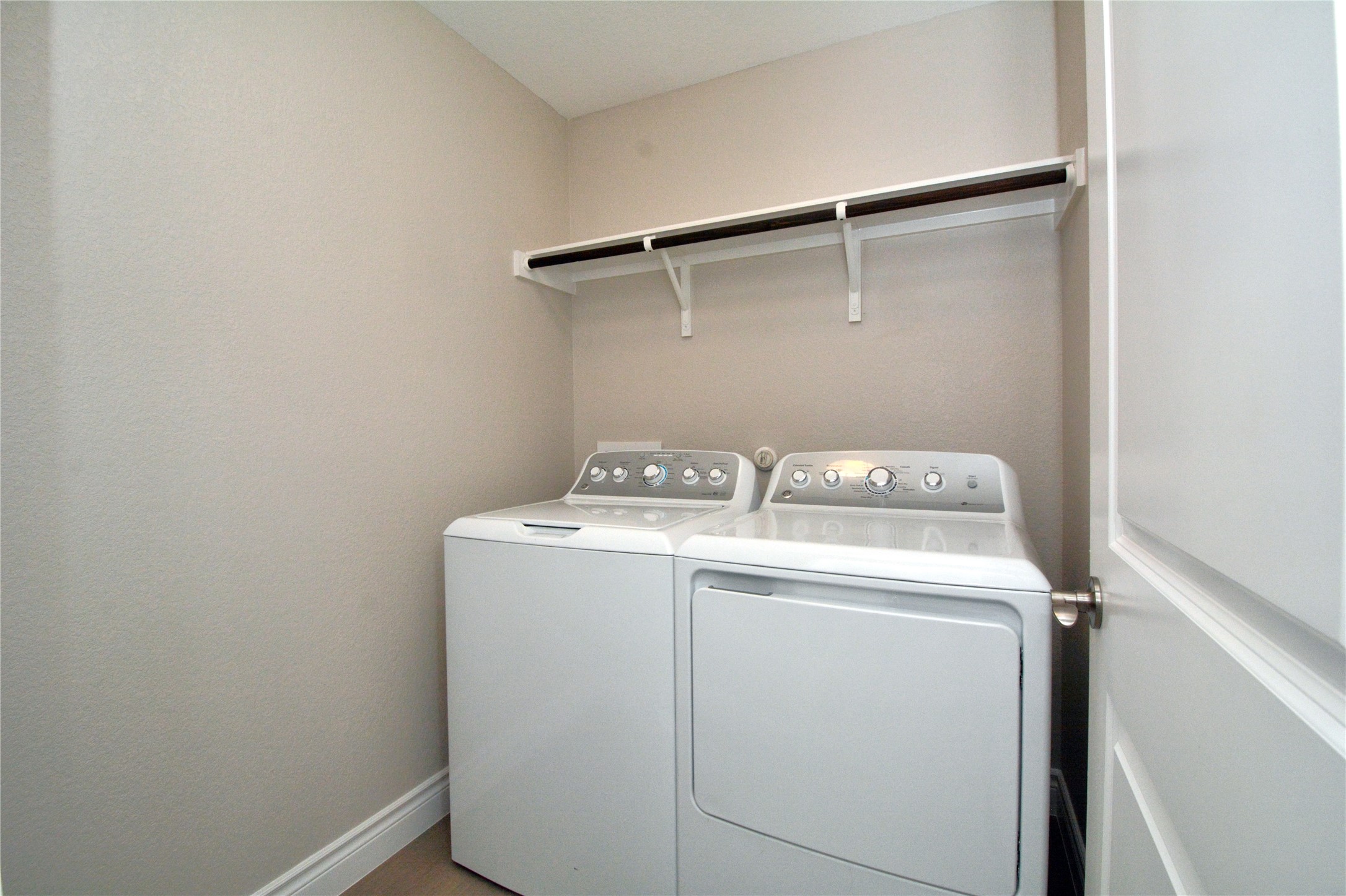 3901 Colorado High Avenue Austin, TX 78744 - Photo 20 of 39 a utility room with dryer and washer