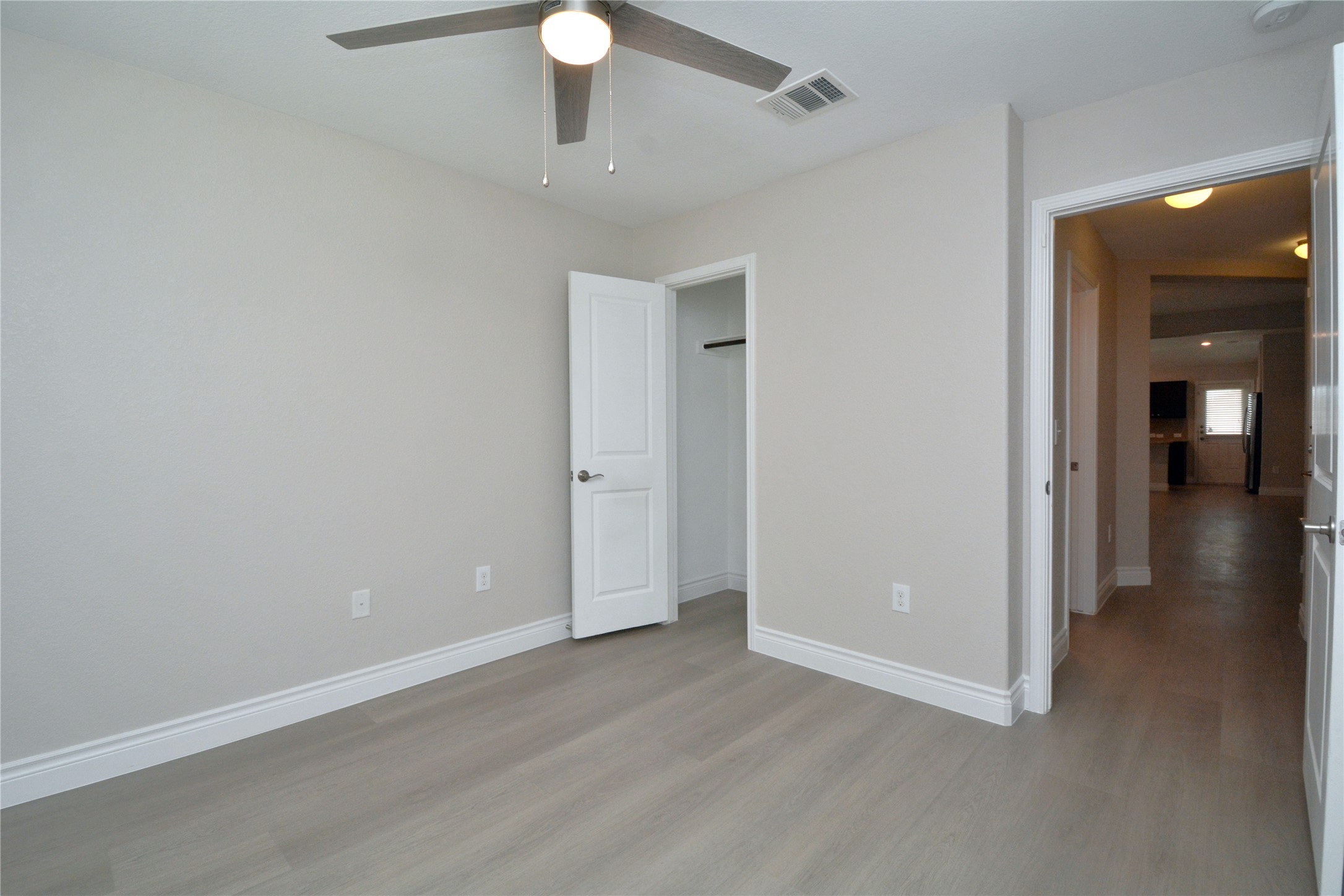 3901 Colorado High Avenue Austin, TX 78744 - Photo 26 of 39 wooden floor in an empty room