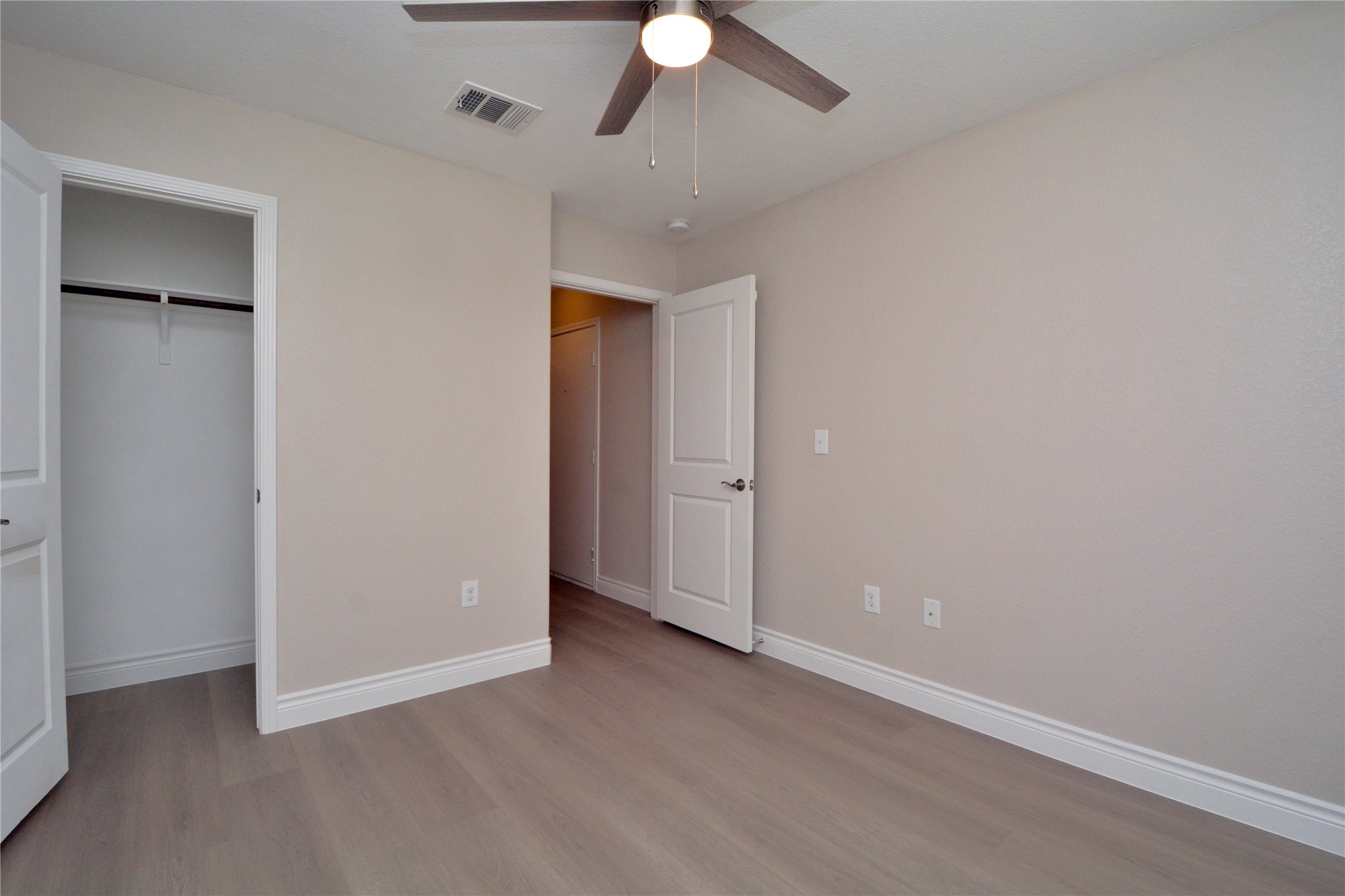 3901 Colorado High Avenue Austin, TX 78744 - Photo 27 of 39 an empty room with a empty space and a ceiling fan