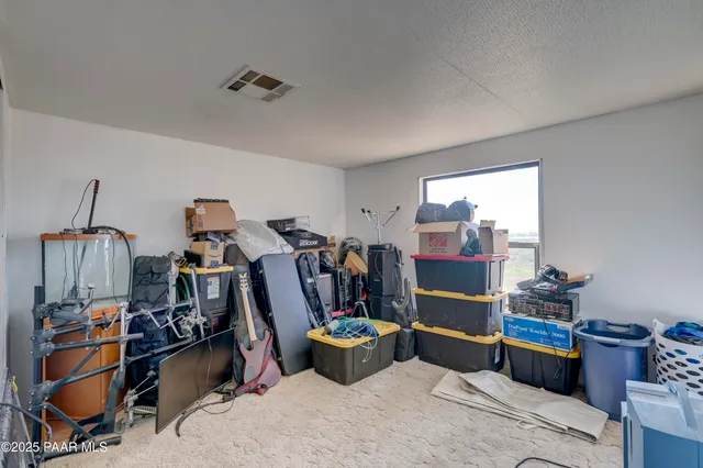 a bathroom with a sink a mirror and a shower