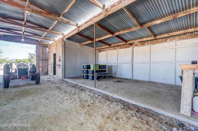 a view of a room with wooden walls