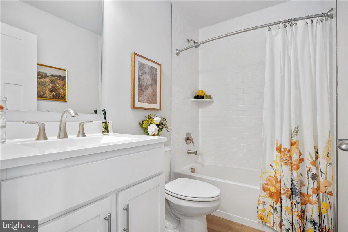 16 Zander Road Inwood, WV 25428 - Photo 33 of 36 a bathroom with a sink toilet and shower