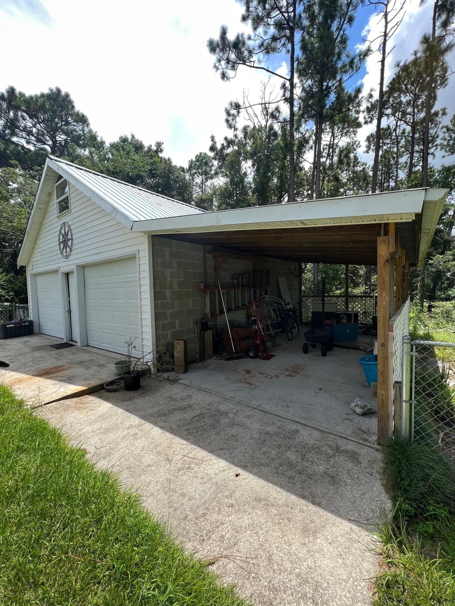 1409 Ridgewood Drive Lillian, AL 36549 - Photo 3 of 28 Side Carport
