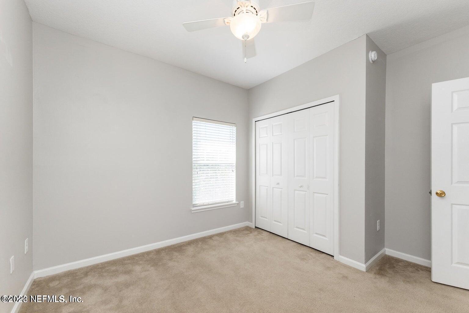 8226 Green Parrot Road, Unit 308 Jacksonville, FL 32256 - Photo 17 of 31 17 - Second Bedroom