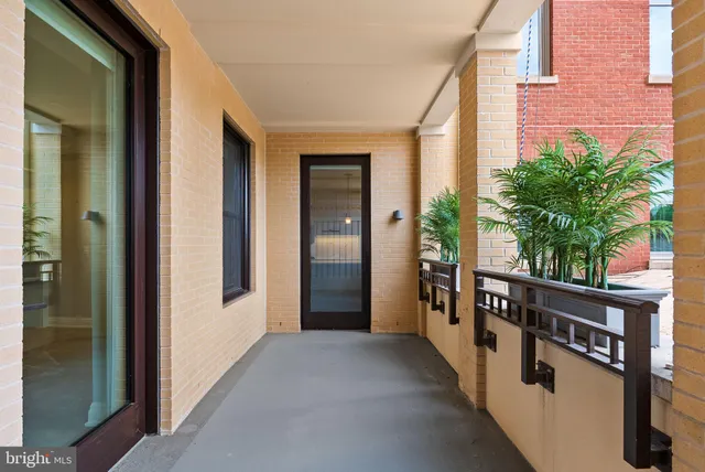 a room with gym equipment and a large window