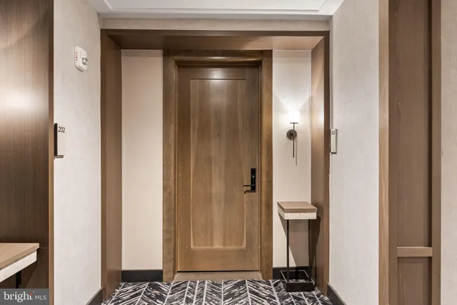 a bathroom with a glass door shower