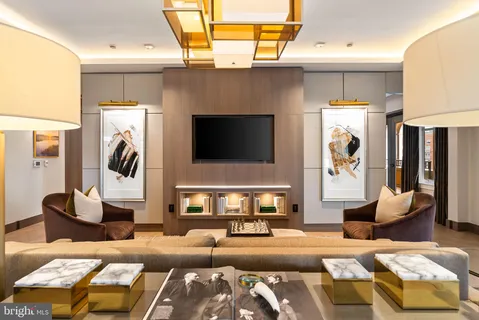 a view of a patio with a table and chairs