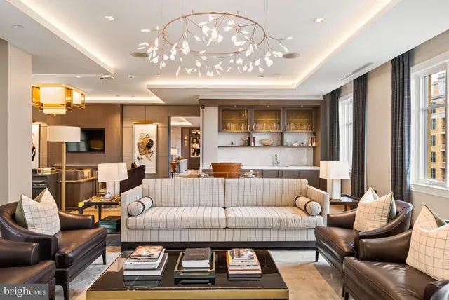 a front view of a building with many windows