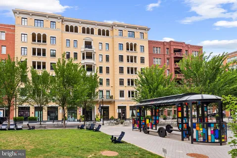 a view of a building with a street