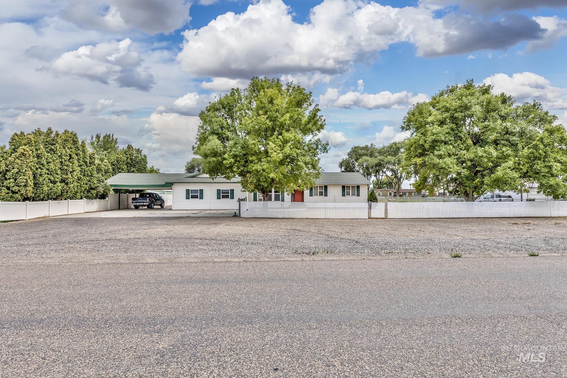 Single story home with a carport