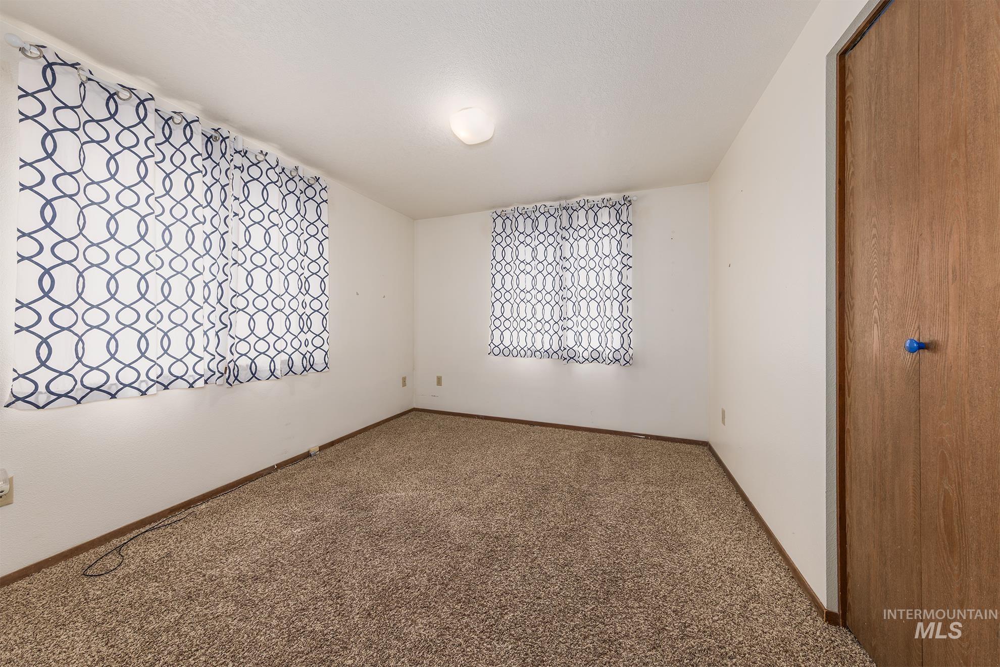 885 Airport Road Vale, OR 97918 - Photo 23 of 36 Unfurnished bedroom with carpet floors