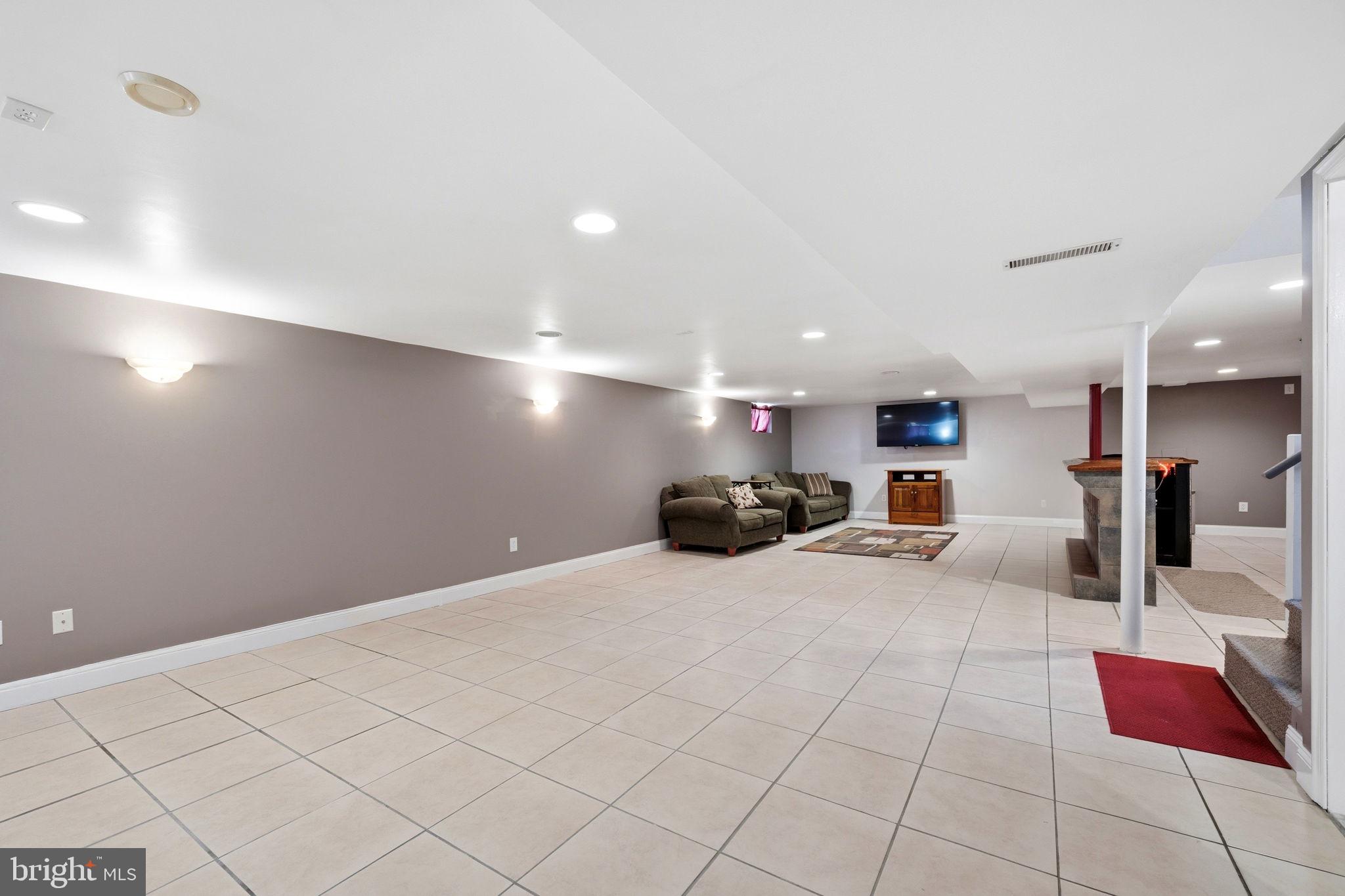 905 Amosland Road Morton, PA 19070 - Photo 33 of 44 Spacious, versatile basement retreat.