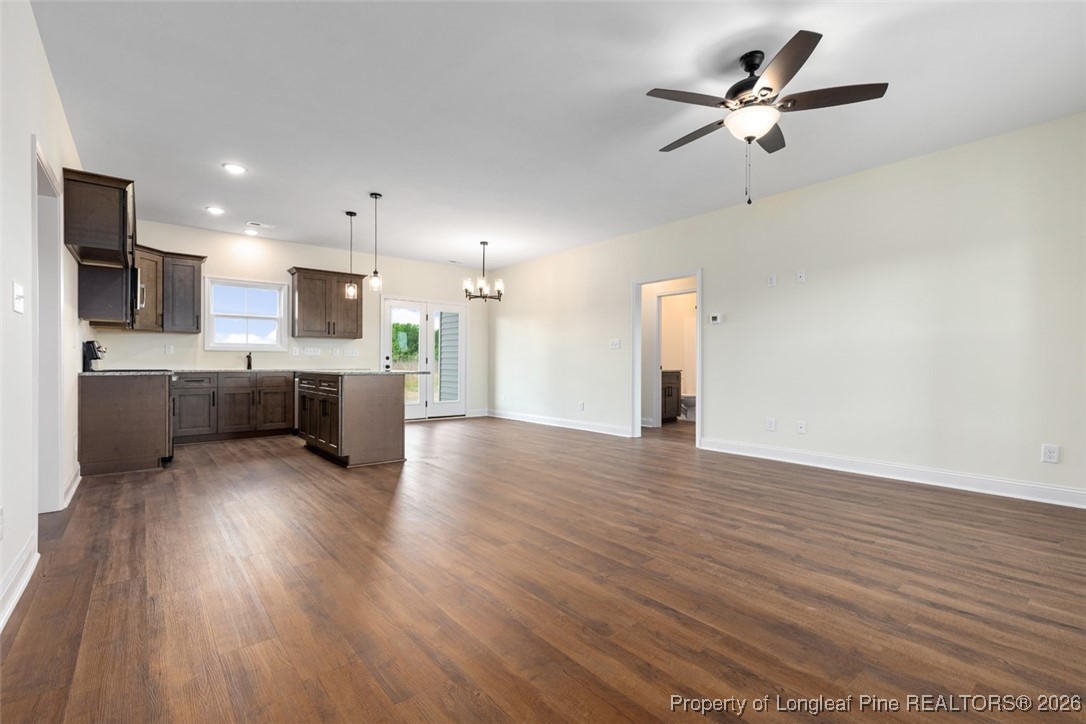 195 Barberry Road Raeford, NC 28376 - Photo 12 of 30 a view of a kitchen with a sink and a microwave