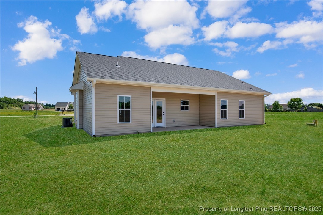 195 Barberry Road Raeford, NC 28376 - Photo 6 of 30 a view of a house with backyard