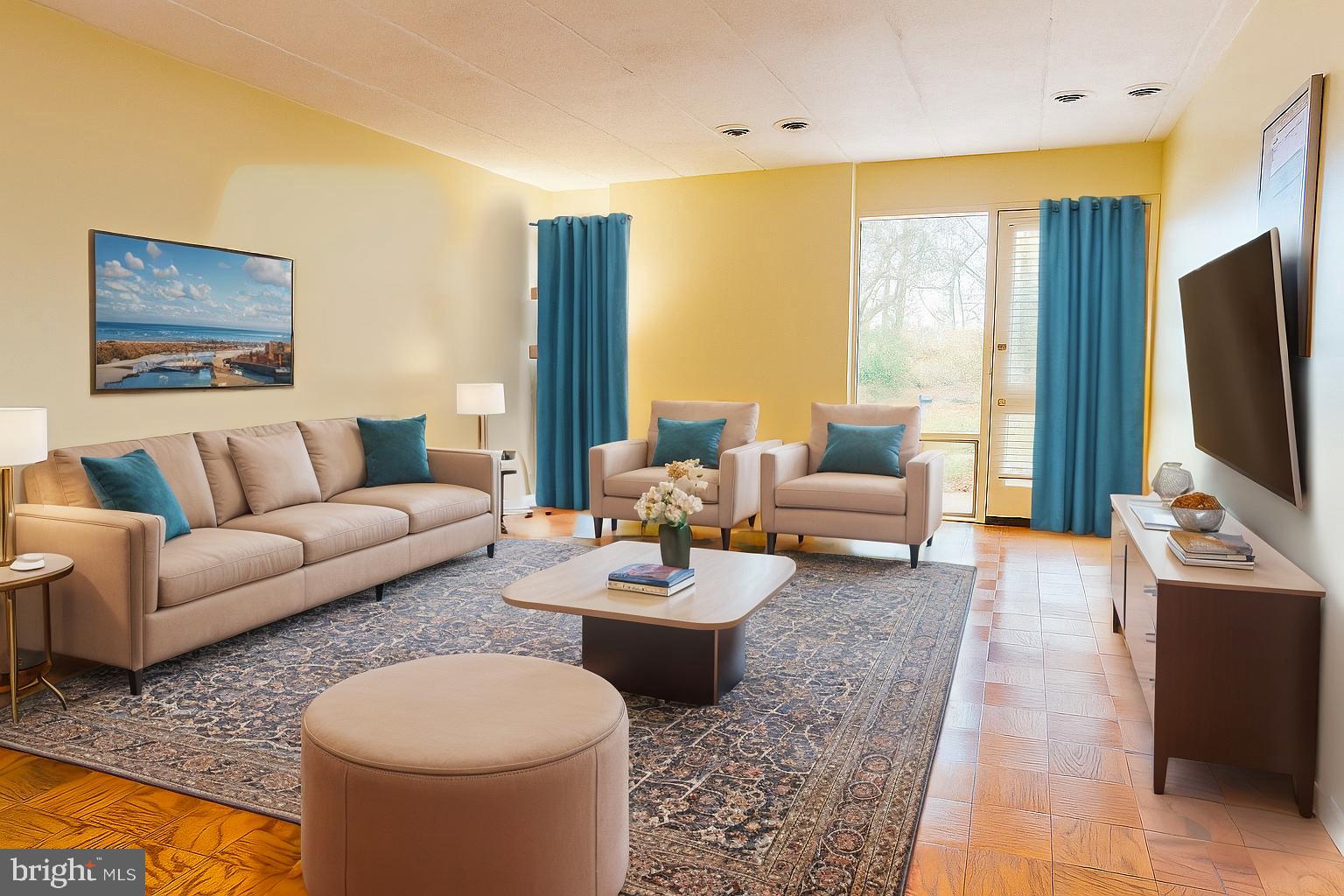 2605 Redcoat Drive, Unit 252 Alexandria, VA 22303 - Photo 3 of 26 a living room with furniture and a flat screen tv
