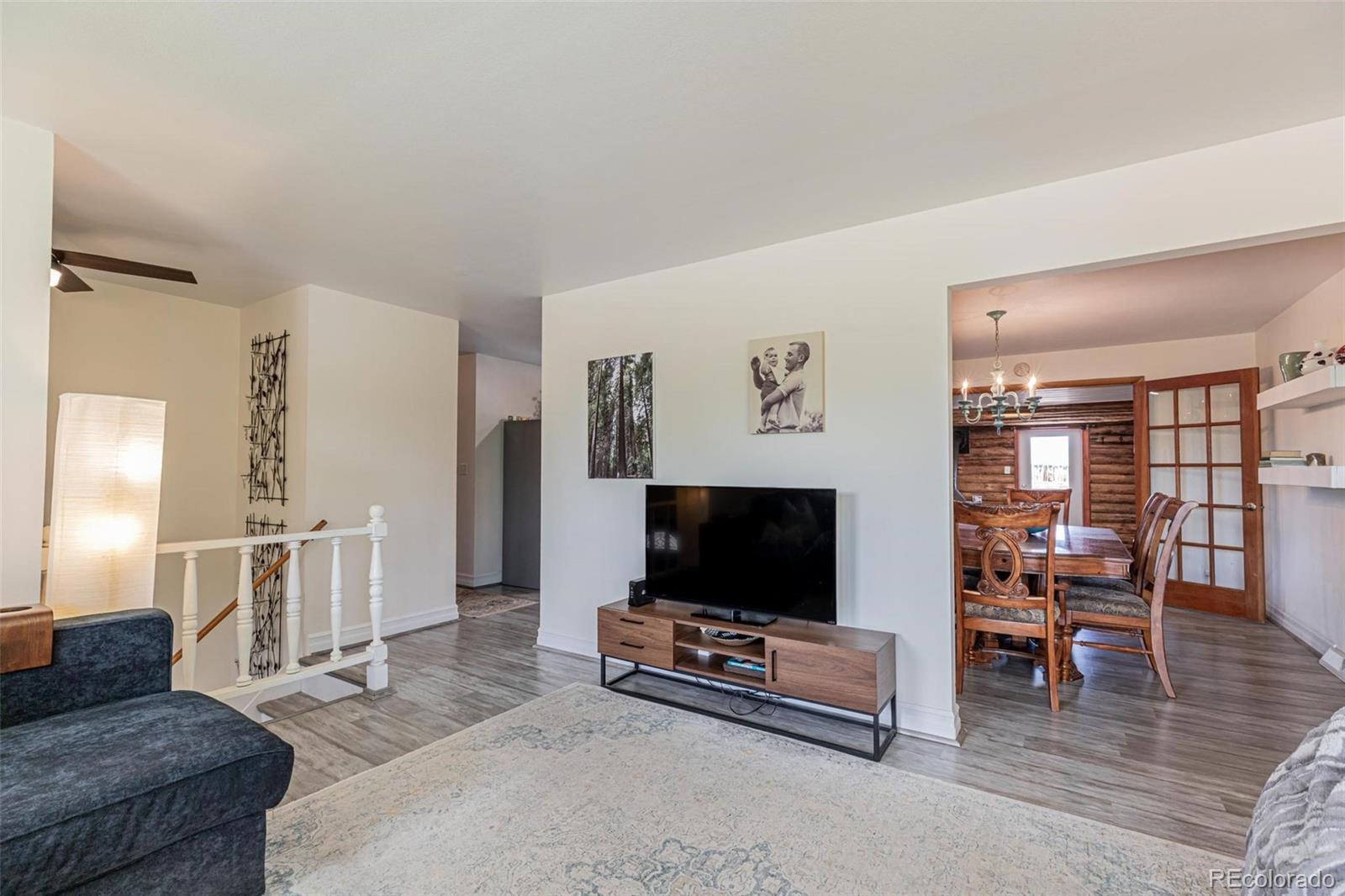 420 Clover Circle Hayden, CO 81639 - Photo 12 of 37 a living room with furniture and a flat screen tv