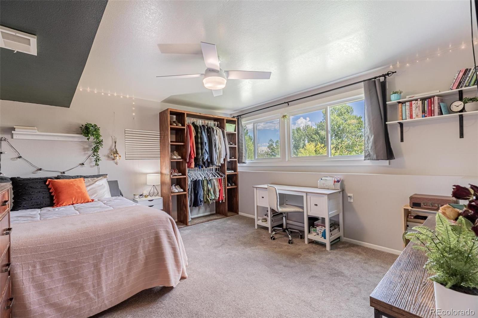 420 Clover Circle Hayden, CO 81639 - Photo 24 of 37 a bedroom with furniture and a large window