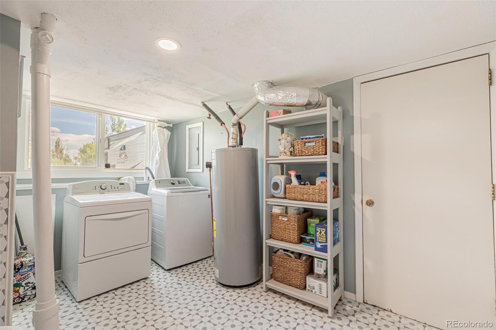 420 Clover Circle Hayden, CO 81639 - Photo 25 of 37 a room with a refrigerator and washer