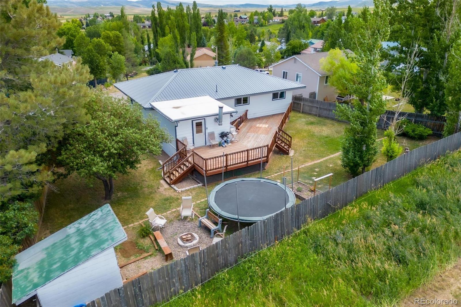 420 Clover Circle Hayden, CO 81639 - Photo 31 of 37 an aerial view of a house with garden space and street view