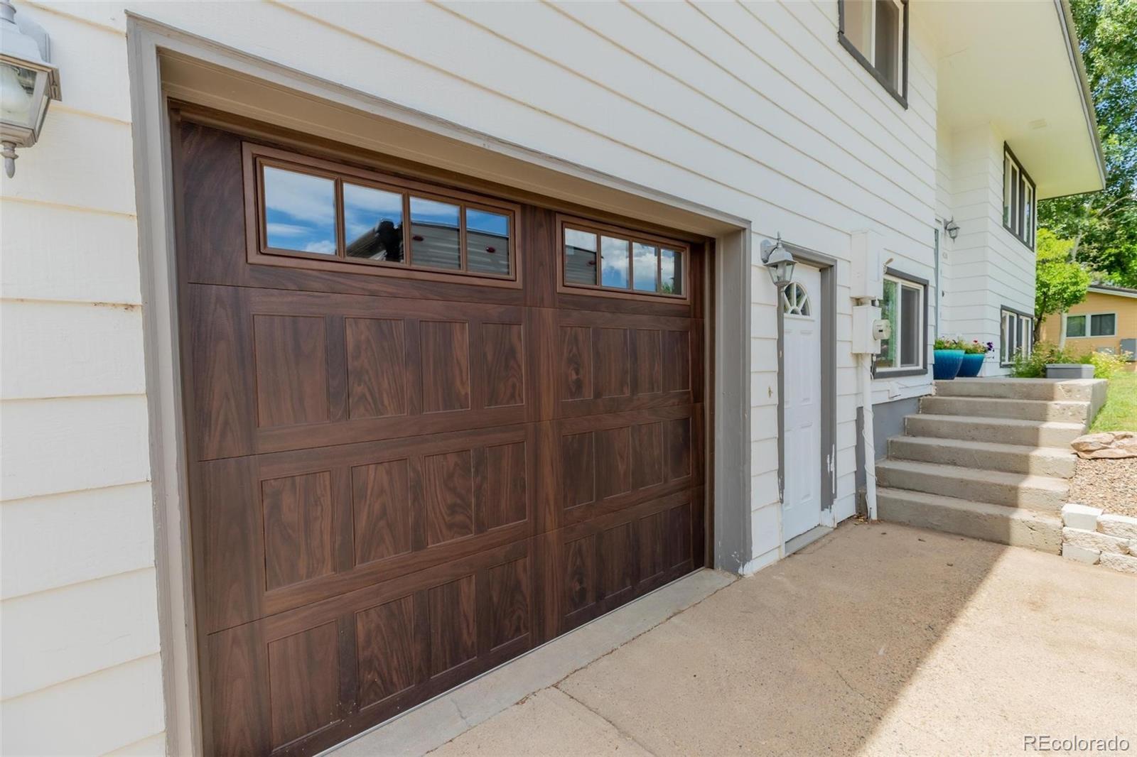 420 Clover Circle Hayden, CO 81639 - Photo 36 of 37 a view of a house with a door and wooden walls