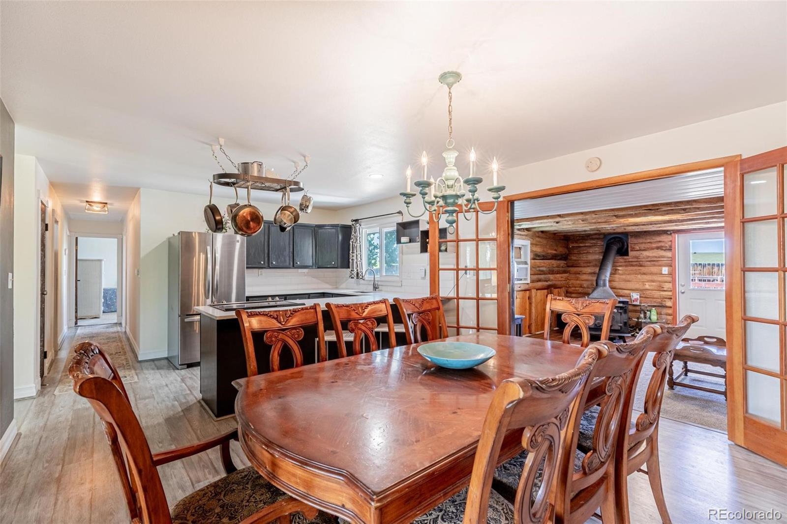 420 Clover Circle Hayden, CO 81639 - Photo 8 of 37 a view of a dining room with furniture and chandelier