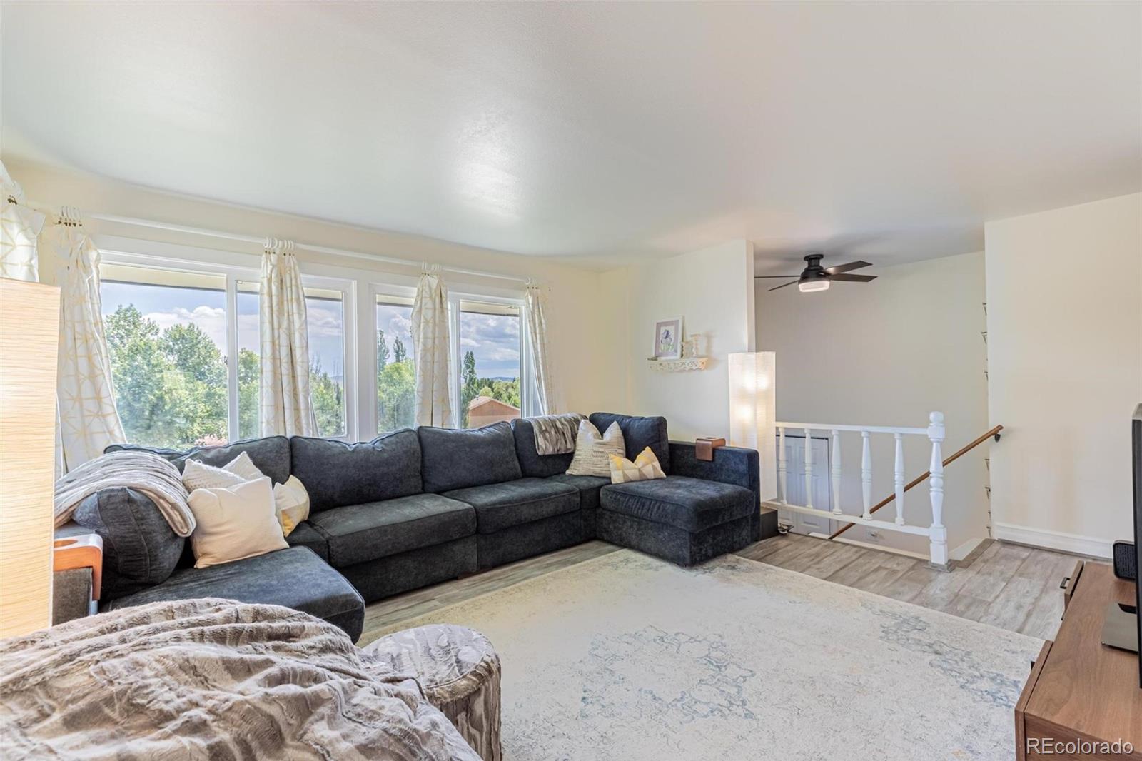 420 Clover Circle Hayden, CO 81639 - Photo 10 of 37 a living room with furniture and a window