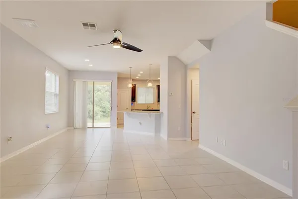 a view of a livingroom with a staircase