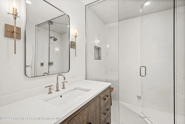 a view of a room that has a bench in it