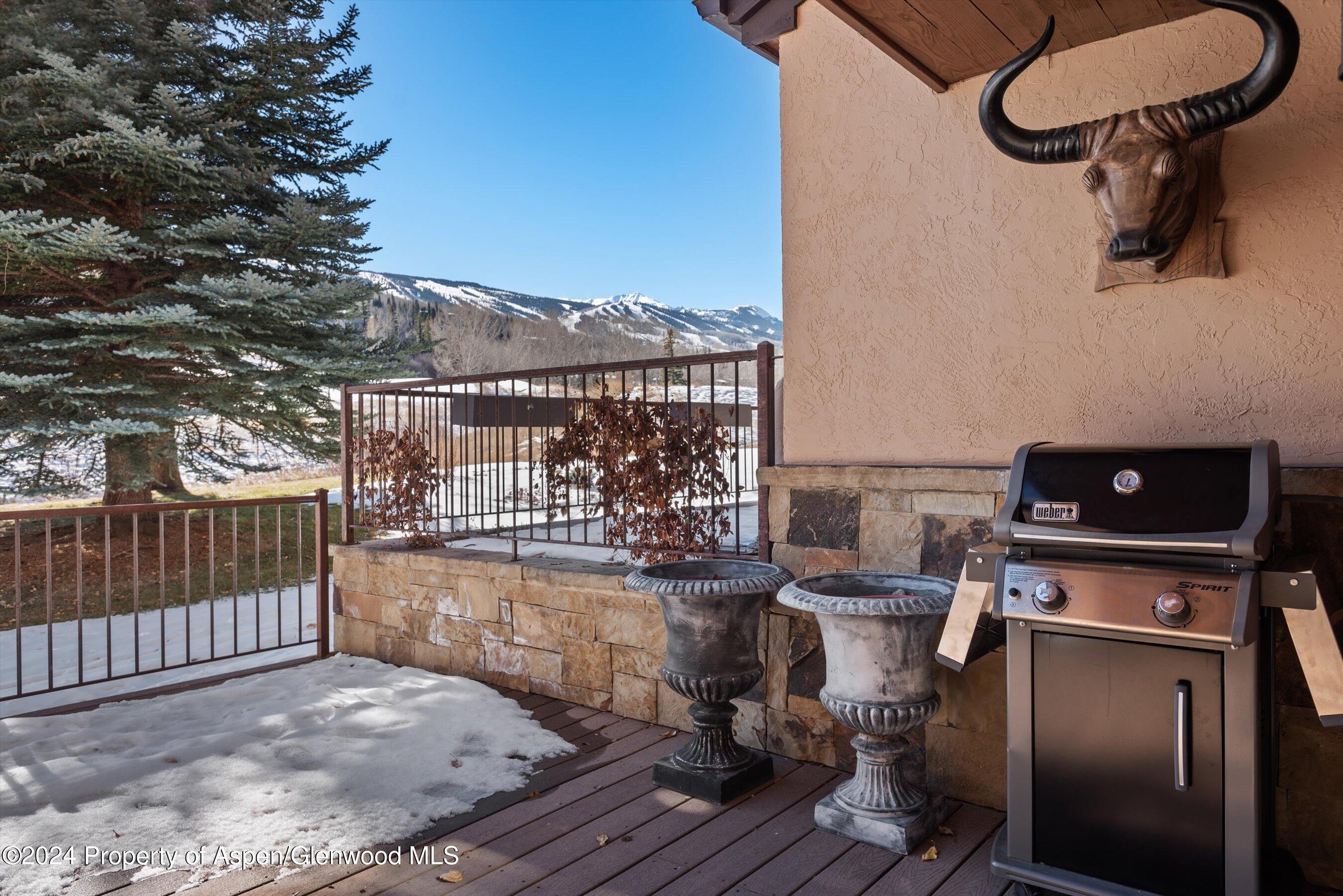 124 Harleston Green Road, Unit 45 Snowmass Village, CO 81615 - Photo 30 of 38 a view of a balcony with chairs