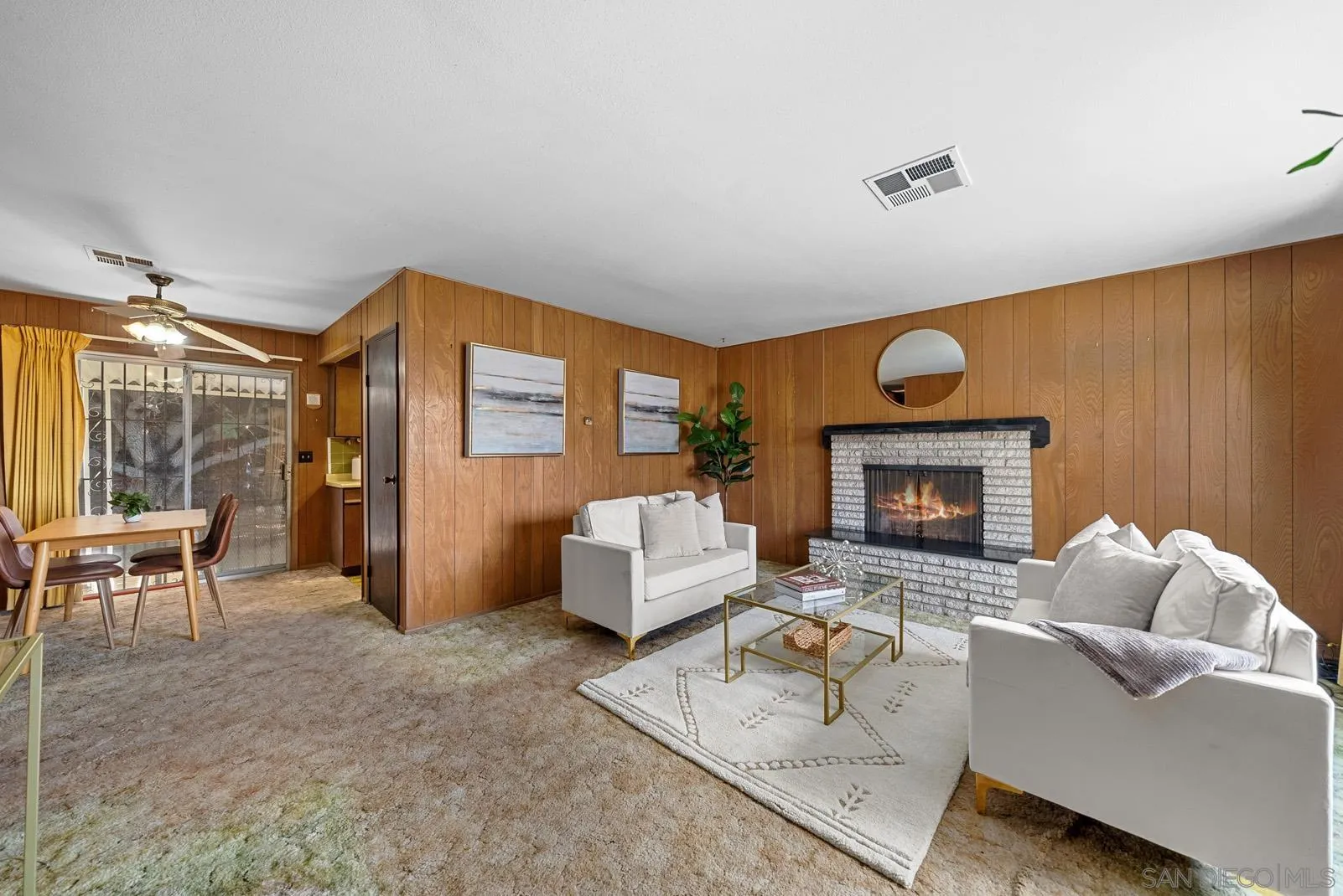 889 Galopago Street Spring Valley, CA 91977 - Photo 16 of 52 a living room with furniture and a fireplace