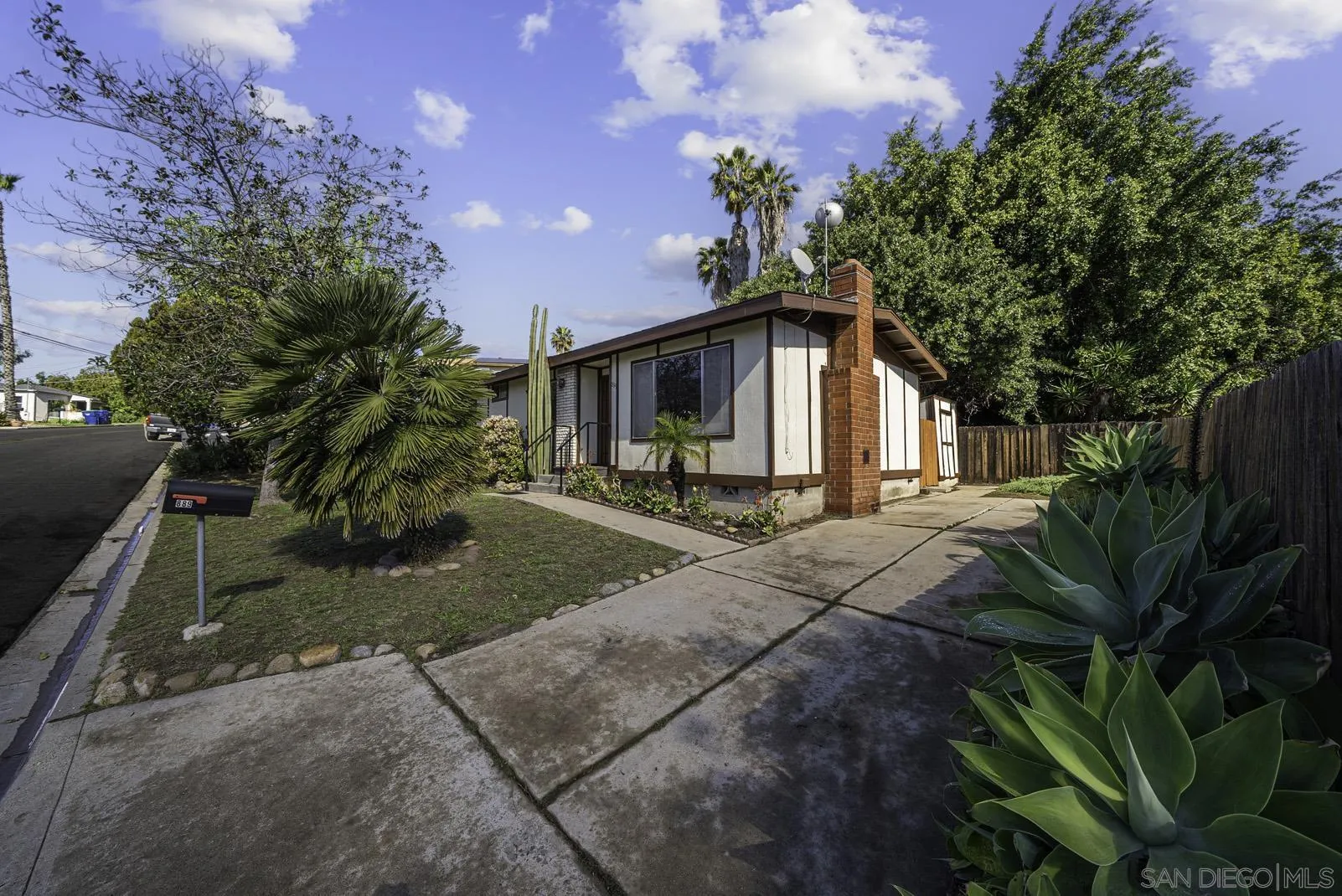 889 Galopago Street Spring Valley, CA 91977 - Photo 34 of 52 a front view of a house with garden