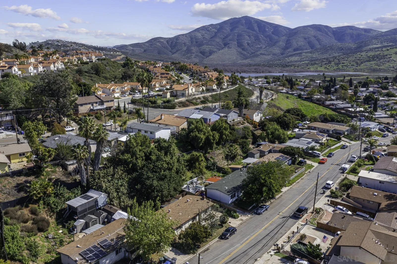 889 Galopago Street Spring Valley, CA 91977 - Photo 44 of 52 an aerial view of residential house and sandy dunes